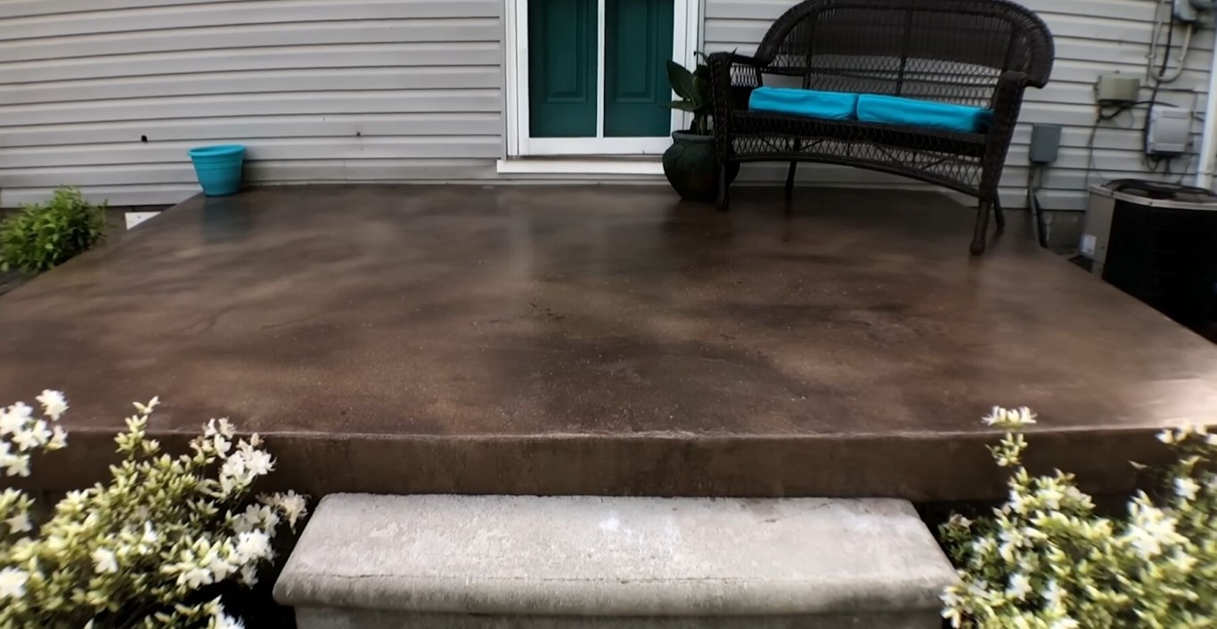 Stained concrete patio with outdoor furniture in Alexandria, VA